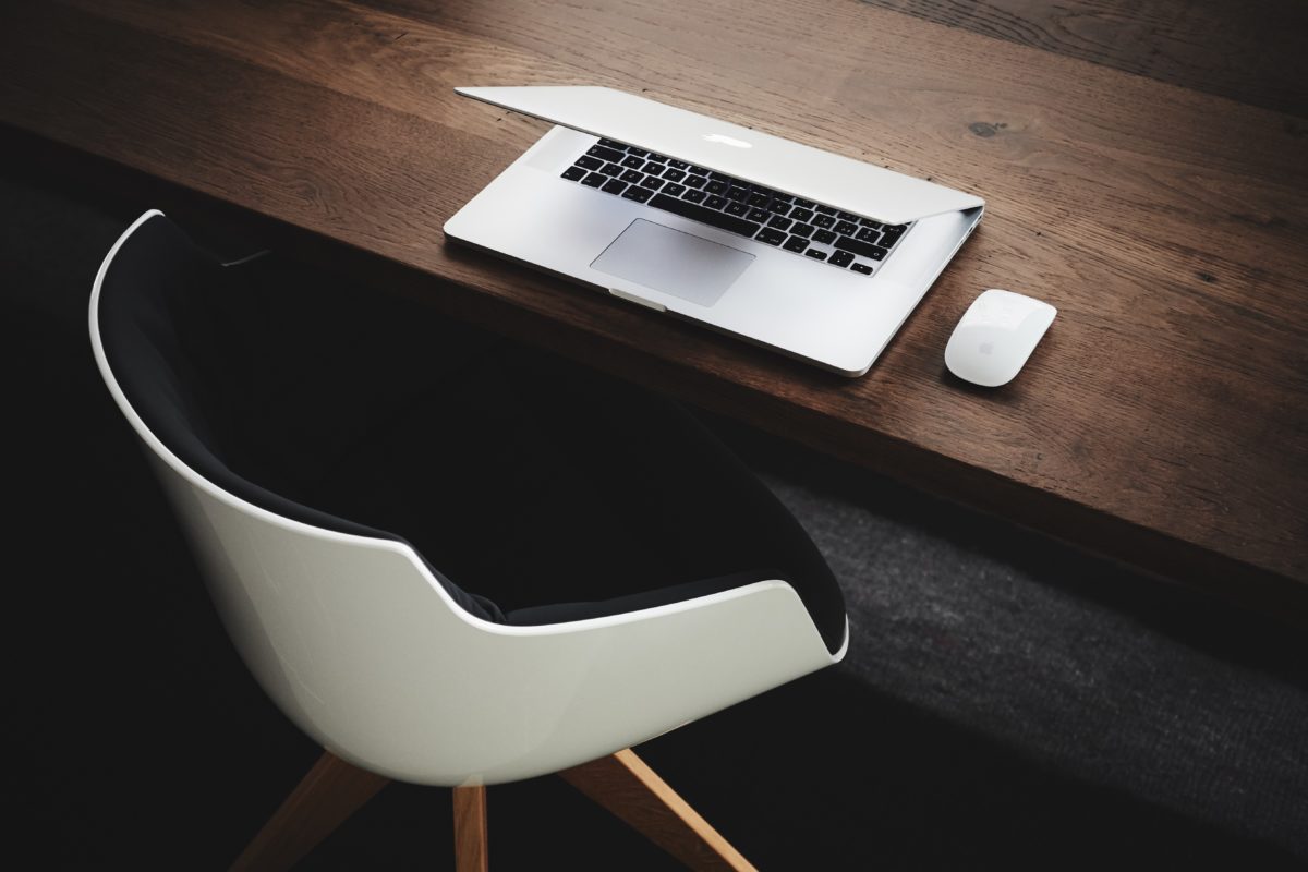 Laptop and mouse on a desk